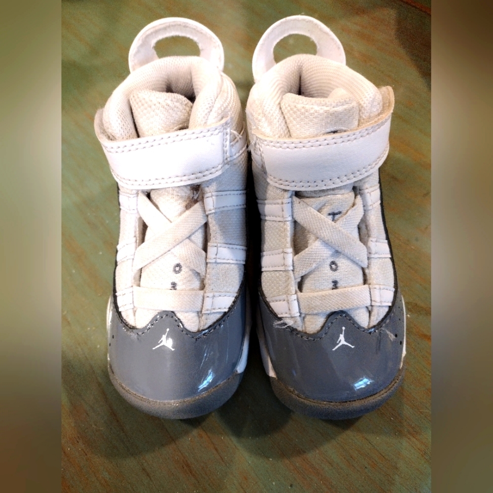Boy's Jordans sneakers with Velcro ties, size 7C, gray and white.